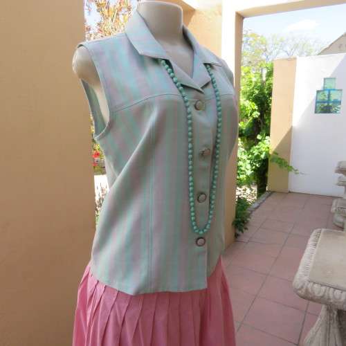 Boutique made sleeveless top in soft blue/pink check pattern. Size 38. As new. Button down front