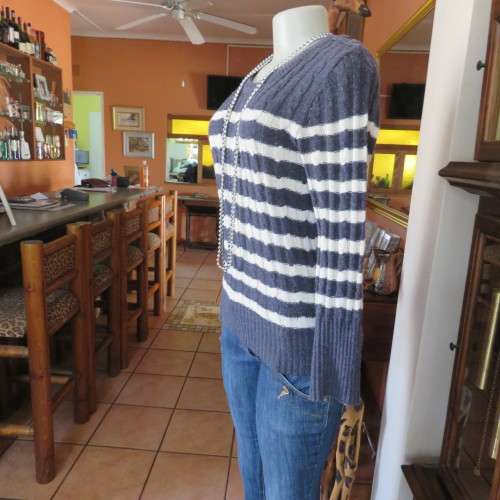 Cable knit pullover long sleeve cardigan in bluegrey. Size 34 to 36. By `Red`. Good condition.