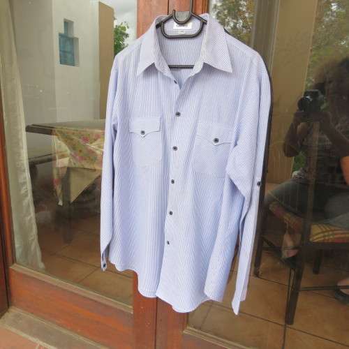 Men`s soft blue and white striped long sleeve shirt. By CENTUARY`.Size L-chest 116cm.Good condition.
