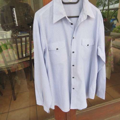 Men`s soft blue and white striped long sleeve shirt. By CENTUARY`.Size L-chest 116cm.Good condition.
