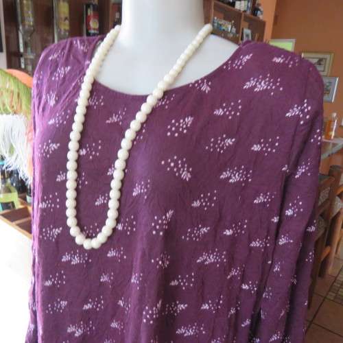 Trendsetting creased mulberry colour loose dress. By `Woolworths`. Size 44/20. Good condition.