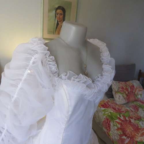 Feminine fairytale wedding dress. By well known boutique. Size 36/12. New condition.