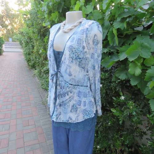 Amazing `Queenspark` slip-over long sleeve top in medley of blues. Size 42/18. New condition.