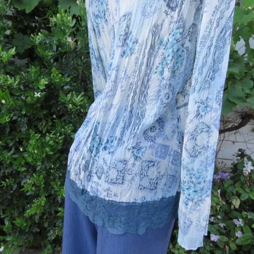 Amazing `Queenspark` slip-over long sleeve top in medley of blues. Size 42/18. New condition.
