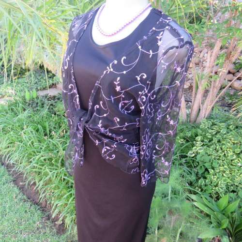 Glamorous black netting long sleeve bolero style cover-up by `St. Bernard` Size 38/14. New condition