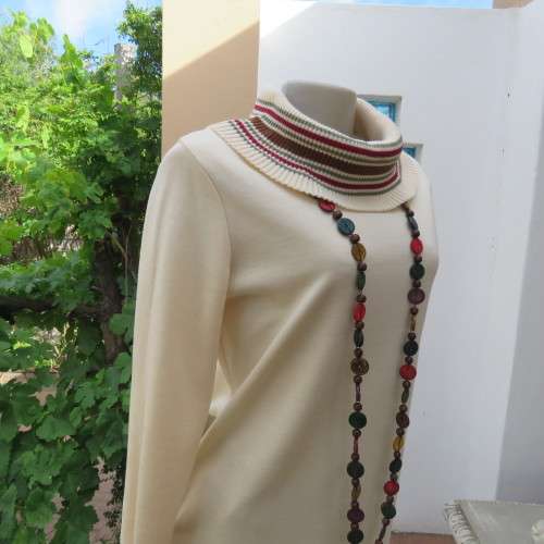 Tunic style long pull-over top. Wide knitted polo neck and cuffs. Size 36/12. Jersey fabric body. .
