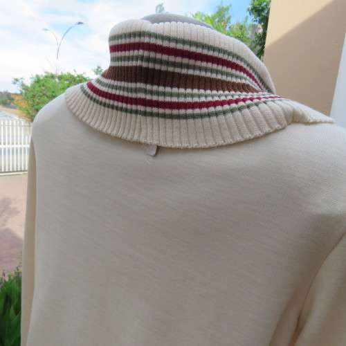 Tunic style long pull-over top. Wide knitted polo neck and cuffs. Size 36/12. Jersey fabric body. .