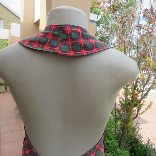 Full apron in heavy black cotton with 2 pockets Resembles pants with waistcoat. Straps to tie.As new