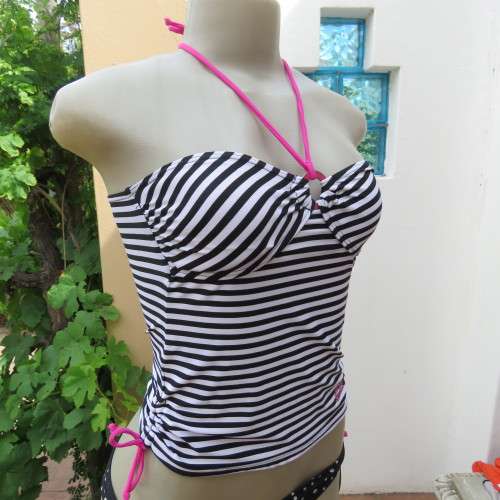 Black and white striped bathing suite top in size 30/6 by `OBR`. Build in bra. New condition.