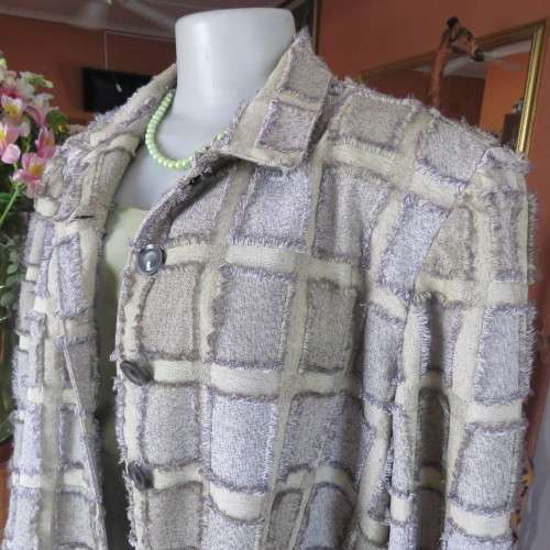 Exceptional boutique made jacket in polycotton fabric with unique detail. Size 44/20. New condition.