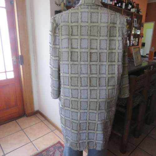 Exceptional boutique made jacket in polycotton fabric with unique detail. Size 44/20. New condition.