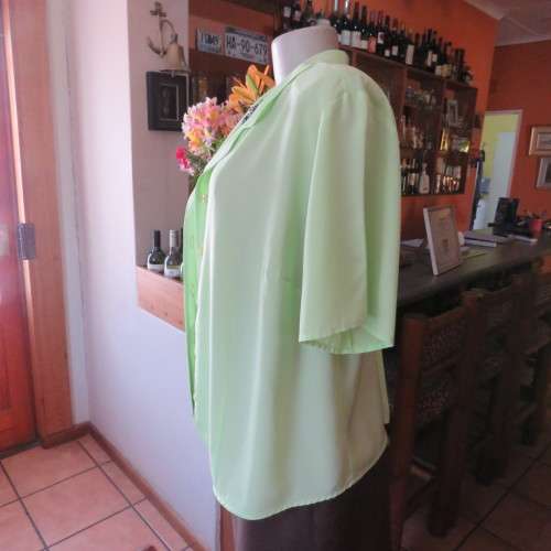 FASHION BUG  lime green soft and silky button down top. Rounded fronts Size 42-44