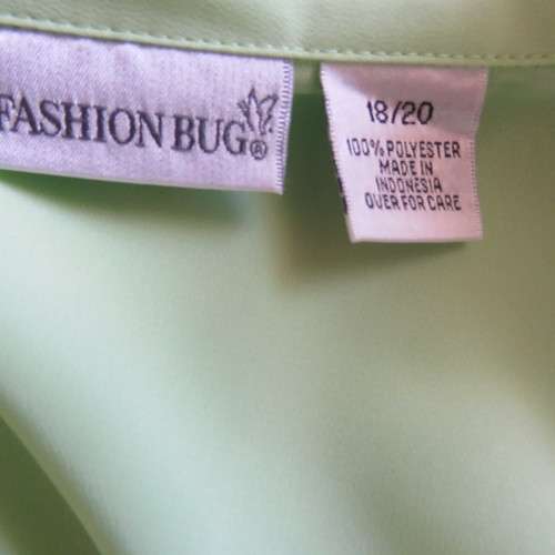 FASHION BUG  lime green soft and silky button down top. Rounded fronts Size 42-44