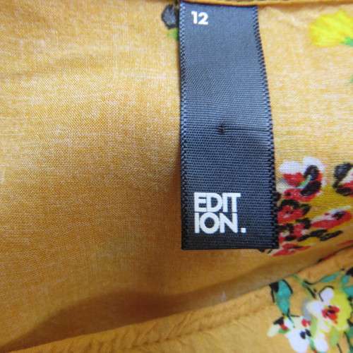 Very sweet little cropped mustard top with colourful floral posies. Size 36/12. By `Edition`. As new