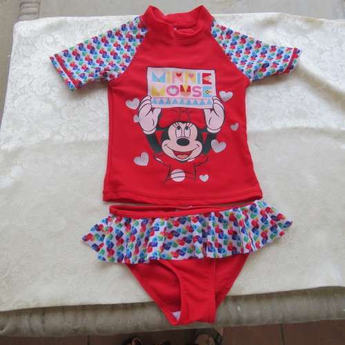 Disney swimsuit with Minni Mouse theme. Bikini with frills. For 3-4 year old girl. New condition.