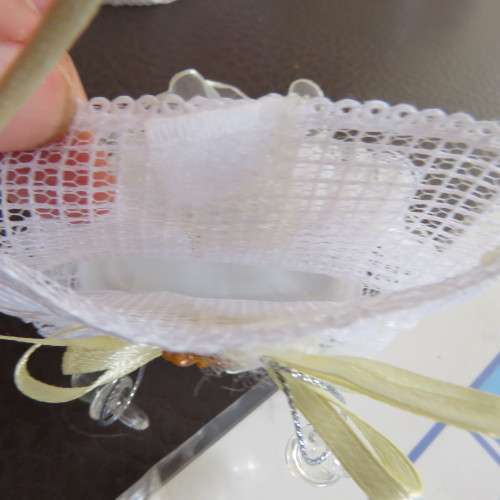 We have ten white and three cream decorated bags suitable for wedding cake or confetti. About 9x7cm.