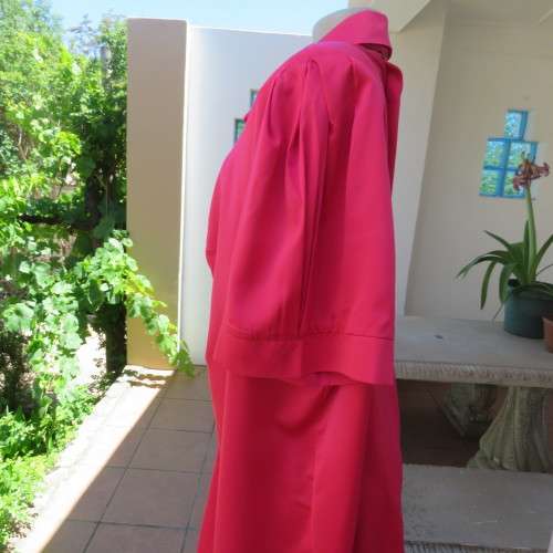 Soft and silky smart magenta pink short sleeve top. By `Donna-Claire. Size 52/28. New condition.