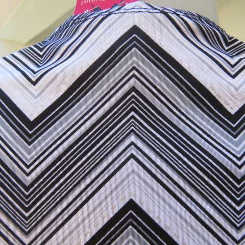 Stunning cross-over long white, black and grey top. By `Donna-Claire`. Size 44/20. New condition.