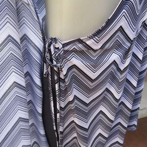 Stunning cross-over long white, black and grey top. By `Donna-Claire`. Size 44/20. New condition.