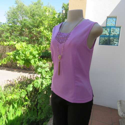 Day to evening wear violet colour sleeveless top. Size 36. New condition.