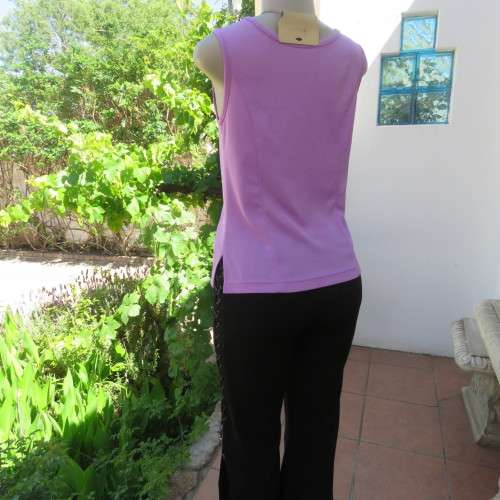 Day to evening wear violet colour sleeveless top. Size 36. New condition.