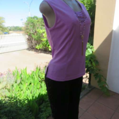 Day to evening wear violet colour sleeveless top. Size 36. New condition.