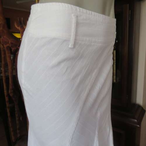Charming white gored skirt with unique rounded panels. By `Identity` in size 34/10. As new.