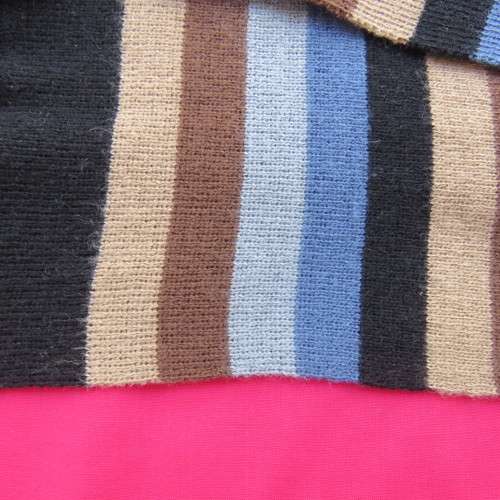 As new. Men`s knitted scarf in brown, cream, grey, blue and black stripes. Size 160cm x 23cm.