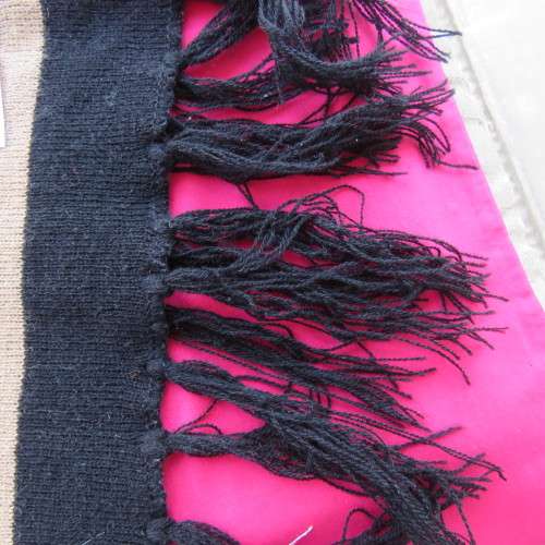 As new. Men`s knitted scarf in brown, cream, grey, blue and black stripes. Size 160cm x 23cm.