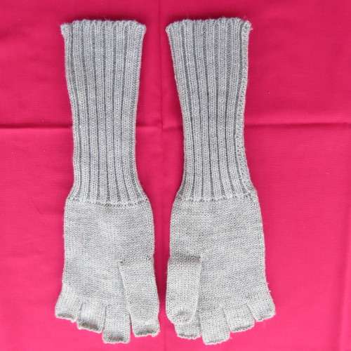 Pretty acrylic knitted fingerless light grey gloves with silver thread. Size Medium. New condition.