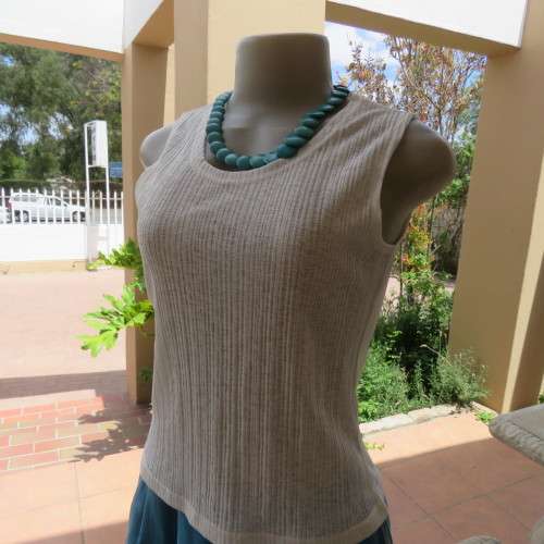 Chic white polyester/nylon blend opaque vest style top by DU FIRRE.Size 34/10. As new