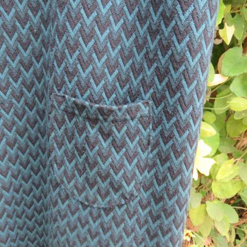 Slip over sleeveless dress in jade and black zig zag pattern. For girl 13 to 14 yrs old ,As new