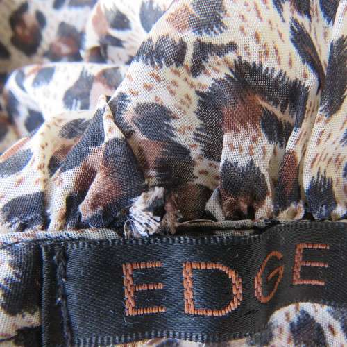 Pretty animal print slip over top in rich cream and brown sheer polyester.By EDGE size 42/18