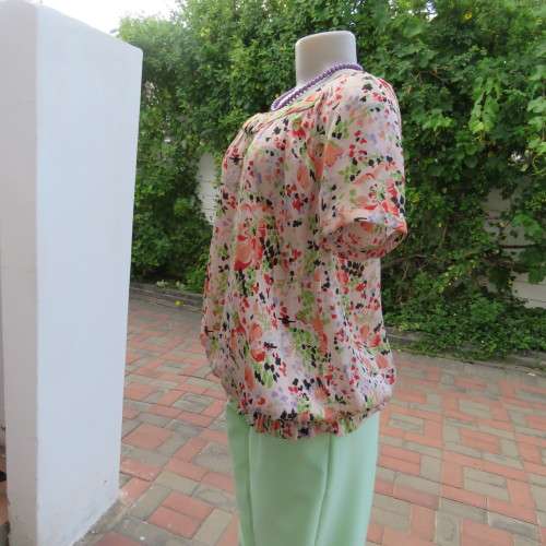 Blouson style top in soft and silky polyester with round banded neckline. Size 36/12 by EXACT