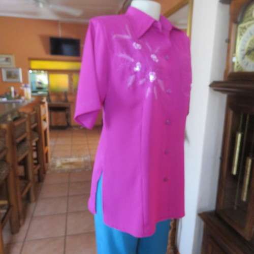 As new violet colour richly embroidered button down top size 38/14. Tailored with open collar.