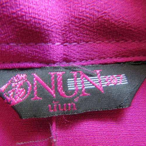 As new violet colour richly embroidered button down top size 38/14. Tailored with open collar.