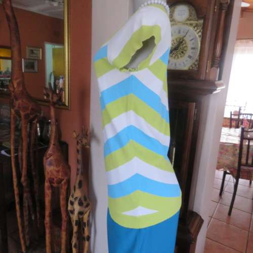 Cute viscose/nylon knit slip over top with diagonal stripes in blue,white and limegreen. Size 34/10.