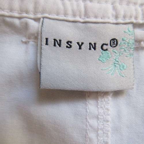 Casual white cropped pants with pockets galore size 42/18 by `INSYNC`. In very good condition.
