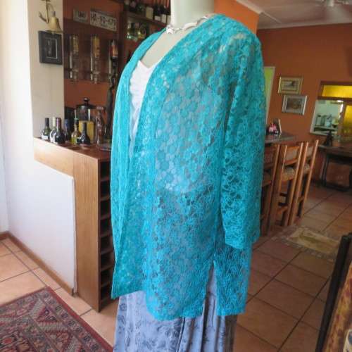 Seagreen owner made acrylic lace open hanging cover up top. Size 46 to 48. Elbow length. As new.