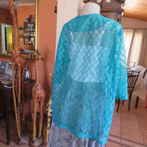 Seagreen owner made acrylic lace open hanging cover up top. Size 46 to 48. Elbow length. As new.