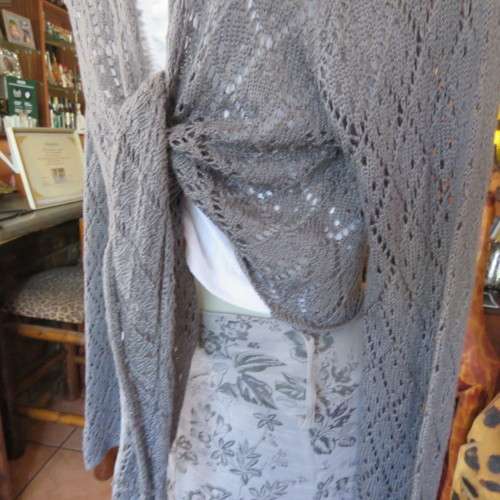 Grey bolero style acrylic knit long sleeve cardigan by `INSYNC` size 44/20. Good condition.