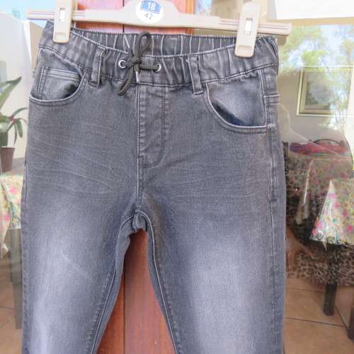 Black stretch polycotton jeans by (andUS) for 12 year old boy. Pockets front + back. As new.