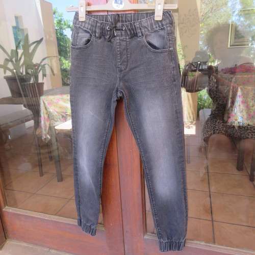 Black stretch polycotton jeans by (andUS) for 12 year old boy. Pockets front + back. As new.