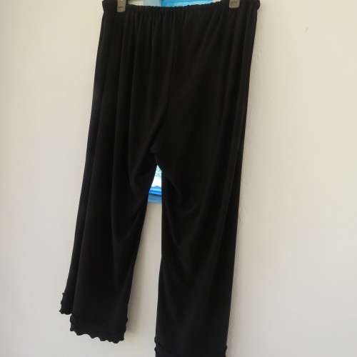 Smart ankle length black stretch polyester pants.Suitable for evening wear size 48/26. New condition