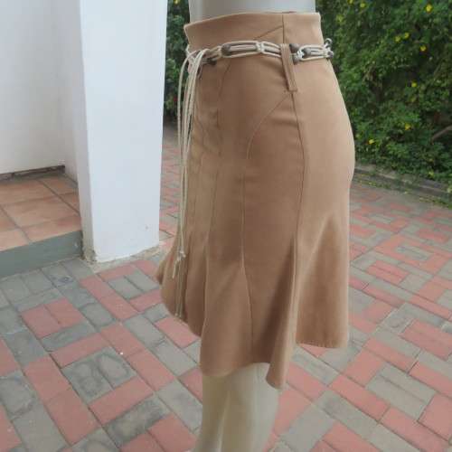 Elegant A-line caramel colour Knee length skirt with unique front panels. Size 30/6 by IQ. Bandless.