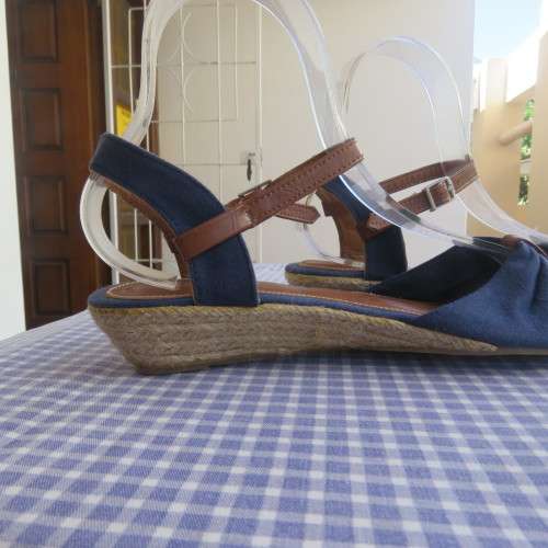 Pair of blue denim sandals with tan colour straps. Sisal low heels by ATMOSPHERE in size 5.