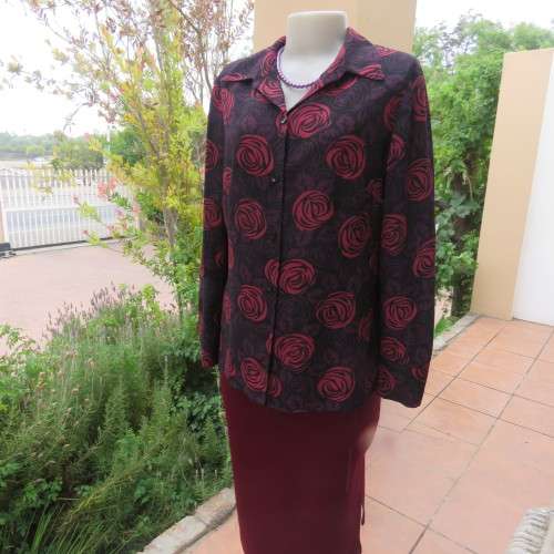 As new Fabulous black, purple and crimson floral patterned long sleeve top by OASIS size 36/12.