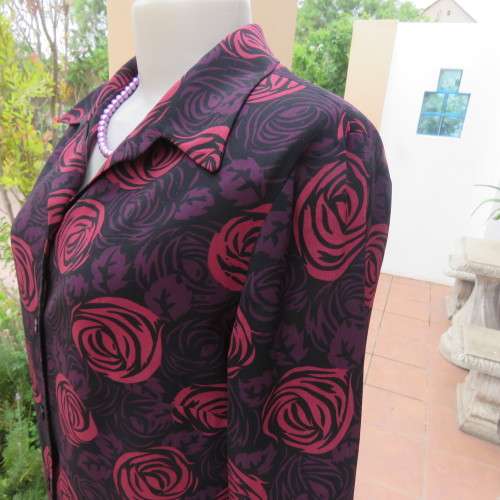 As new Fabulous black, purple and crimson floral patterned long sleeve top by OASIS size 36/12.