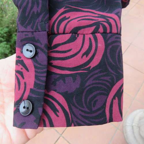 As new Fabulous black, purple and crimson floral patterned long sleeve top by OASIS size 36/12.