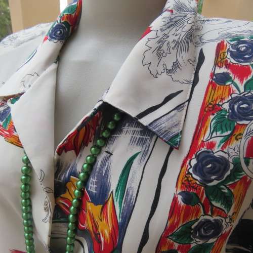 NOTICE ME short sleeve top with button down front. Size 48/24 by SOFT BLOUSE. In 100% polyester.